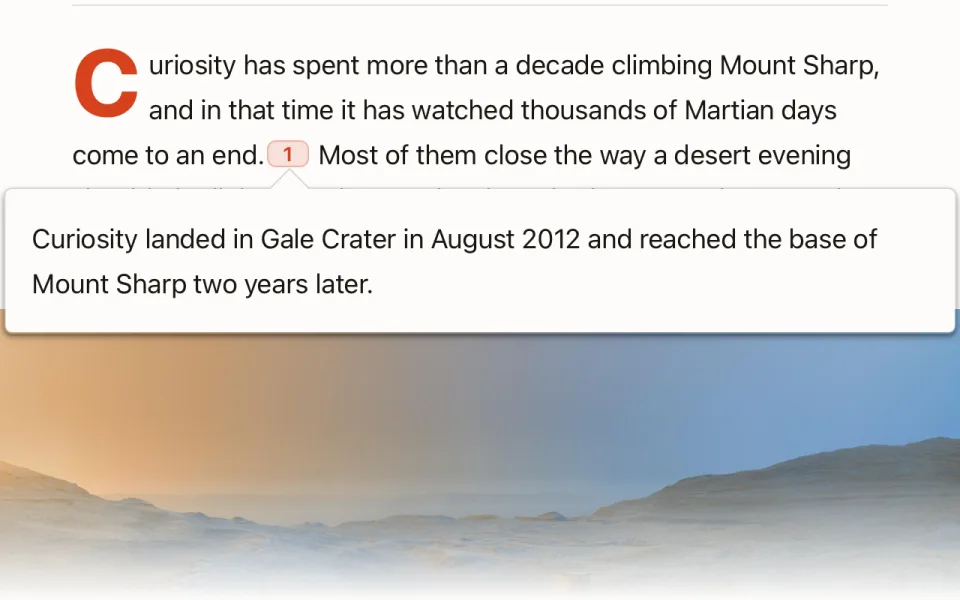 A footnote popover open beneath the paragraph that cites it, showing the note text.